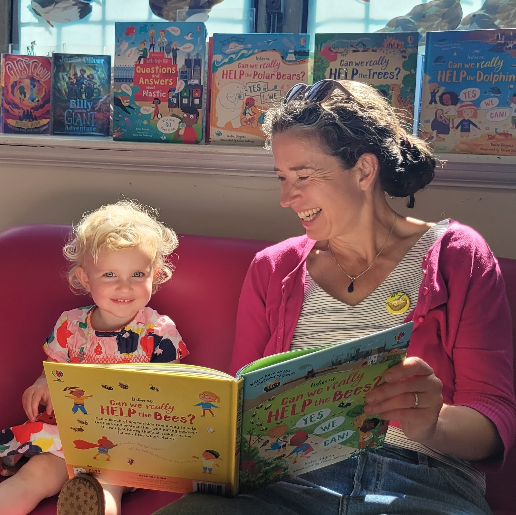 Katie Daynes reading to two-year-old Holly Dembizky at Skipton Library