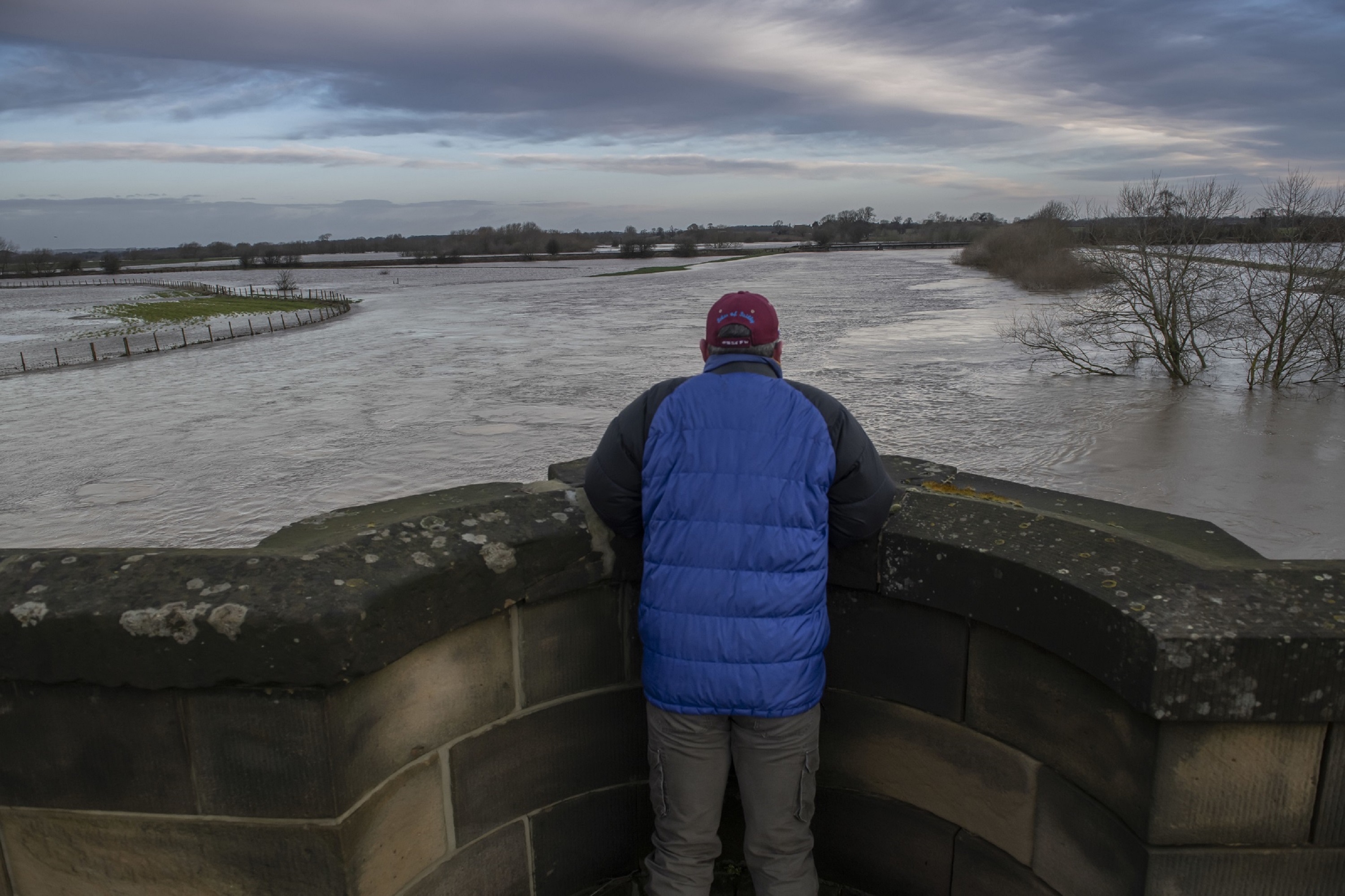 A person looking at flooding in North Yorkshire
