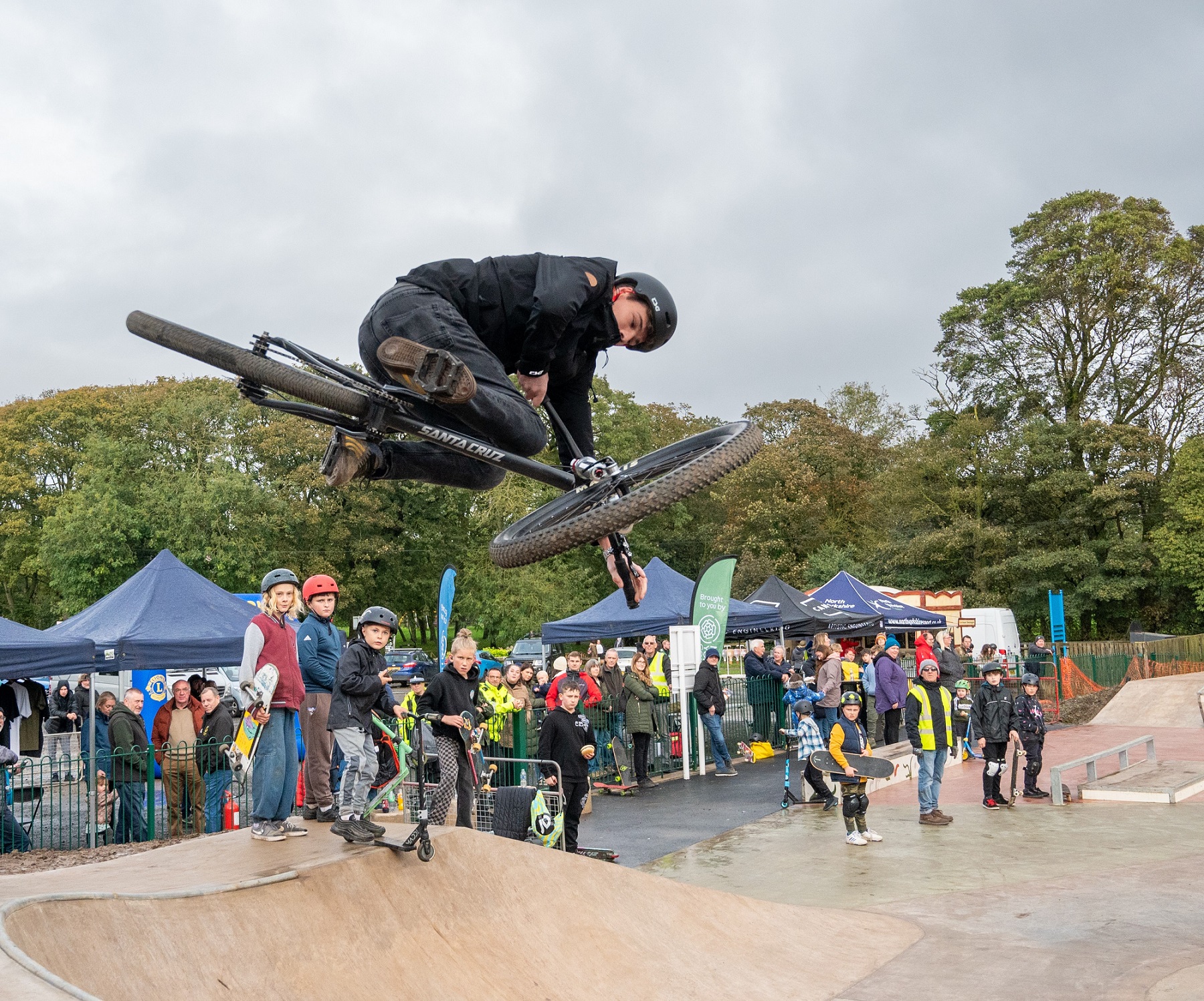A cyclist trying out the new skate park in front of crowds at the official opening event on Saturday. 