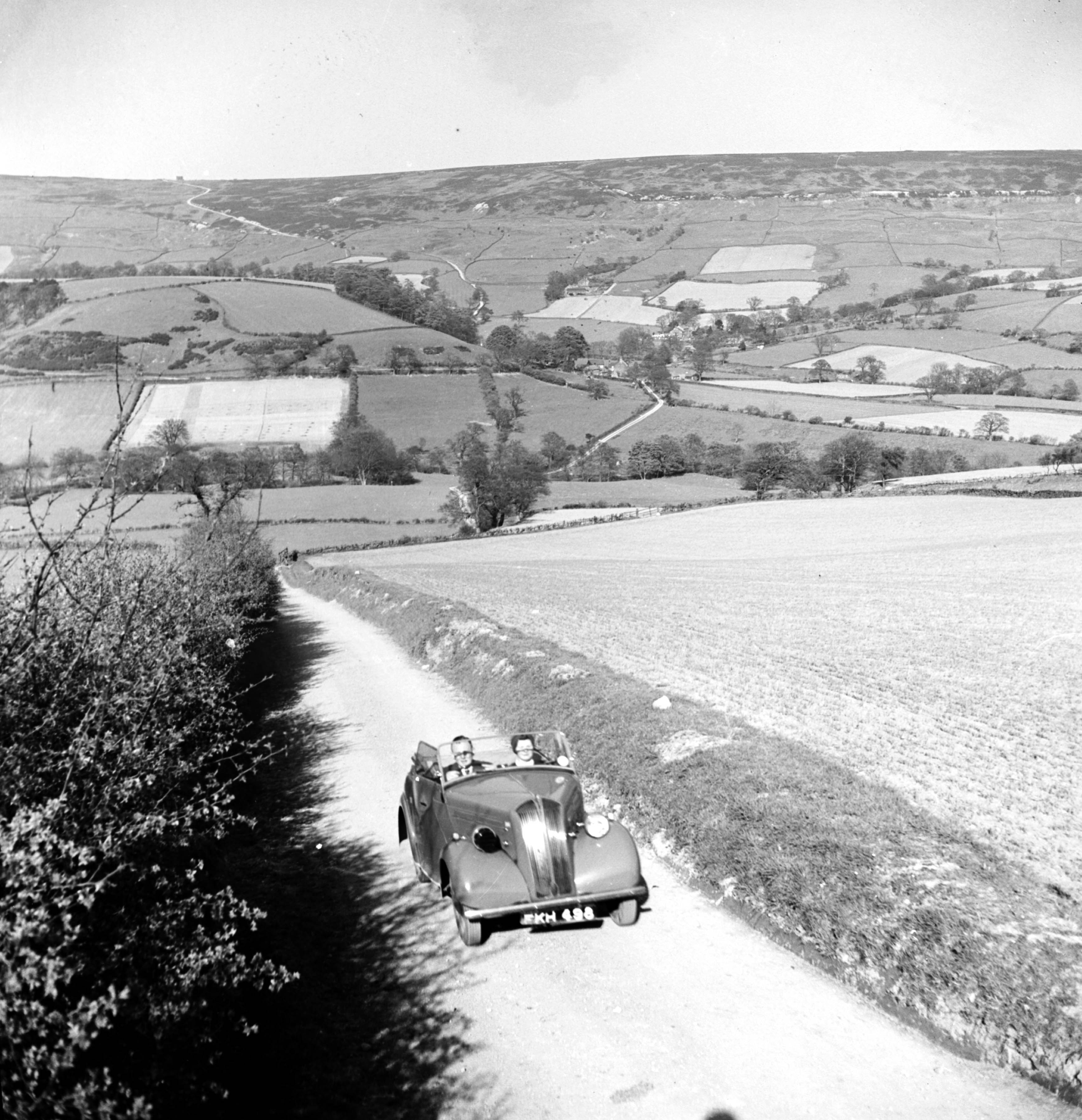 Driving through Farndale (no date). From the Bertram Unné photographic collection.