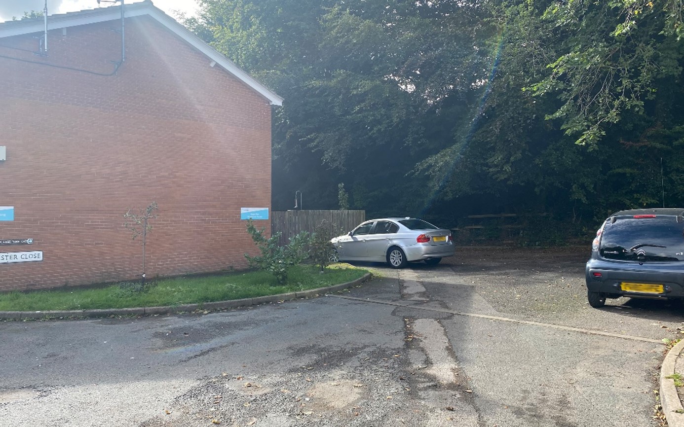 A car parked next to the Chichester Close is a gateway 