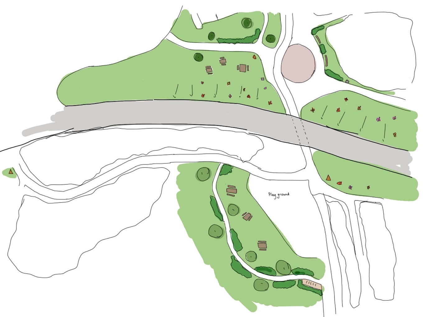 The circular community art paving is to the north, with new benches proposed around it. Picnic tables nearby provide for a quieter resting space.