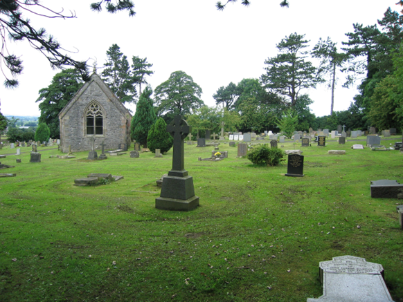 An image of Ingleton Cemetery showing some of the graves and memorials.