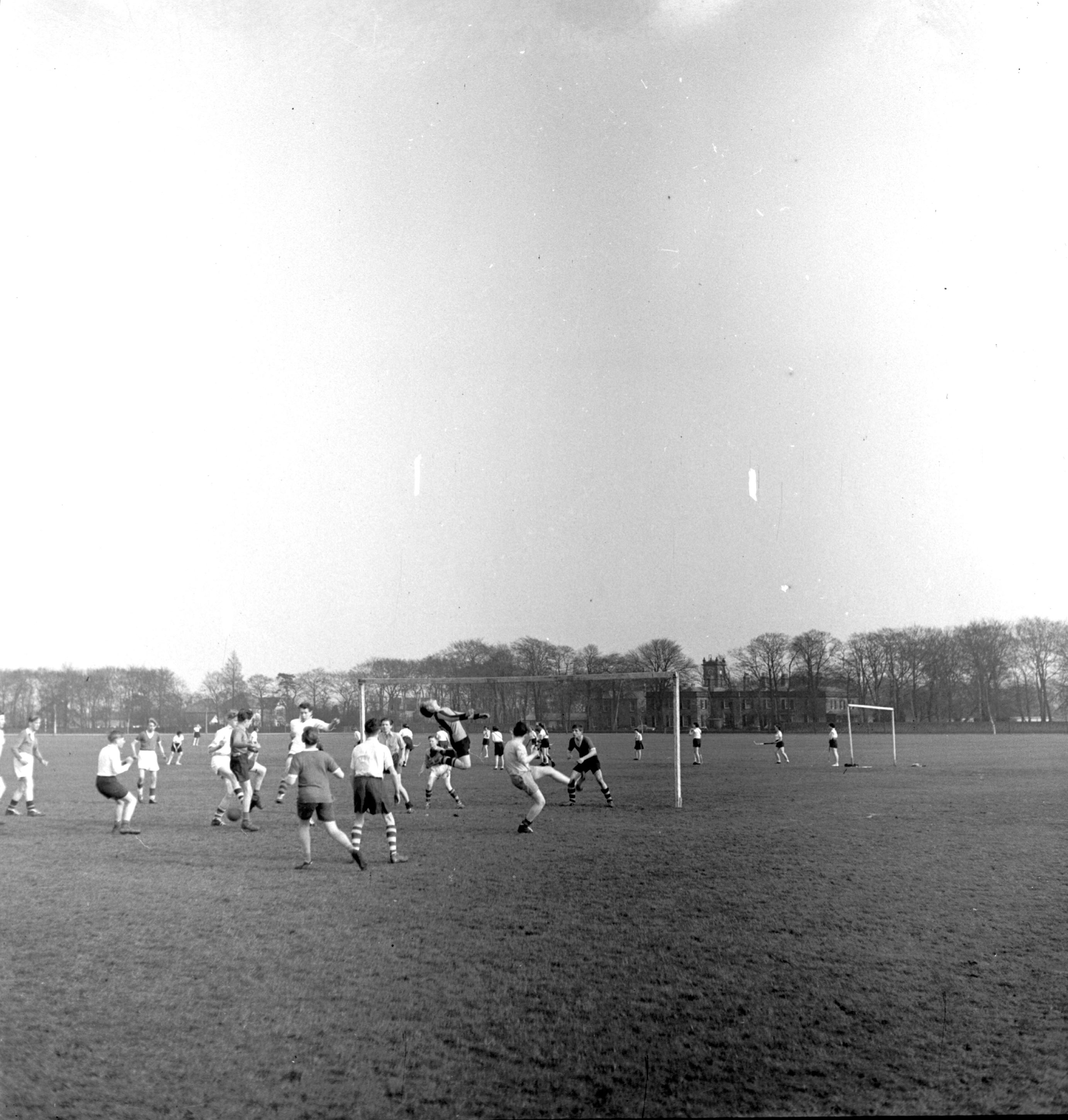Hockey and football matches underway on The Stray in Harrogate in the 1950s.