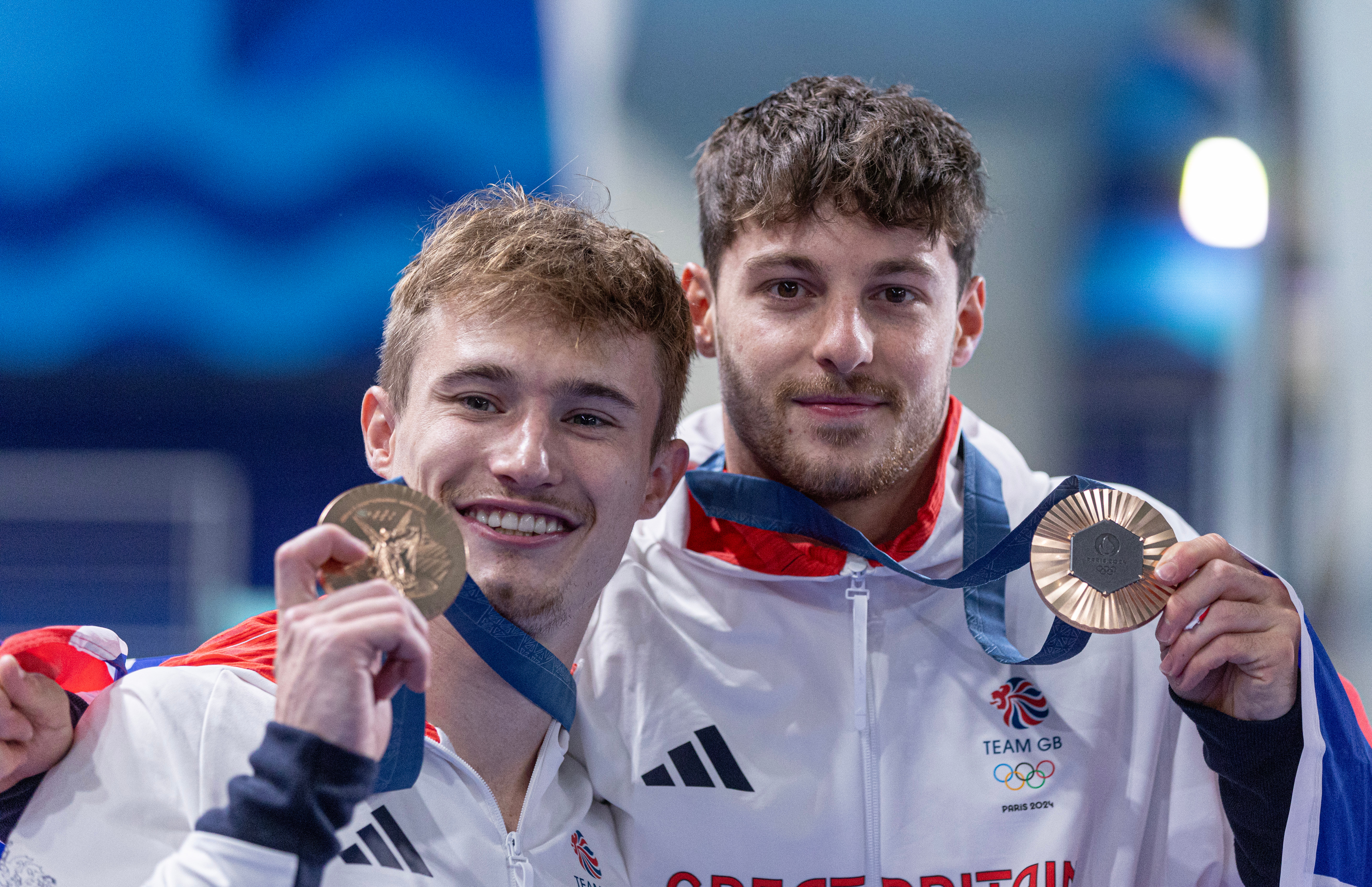 Jack Laugher and dive partner with their bronze medals. 