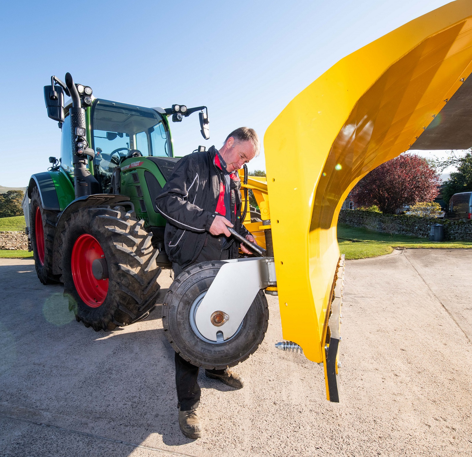 Pete Iveson working on him snow plough