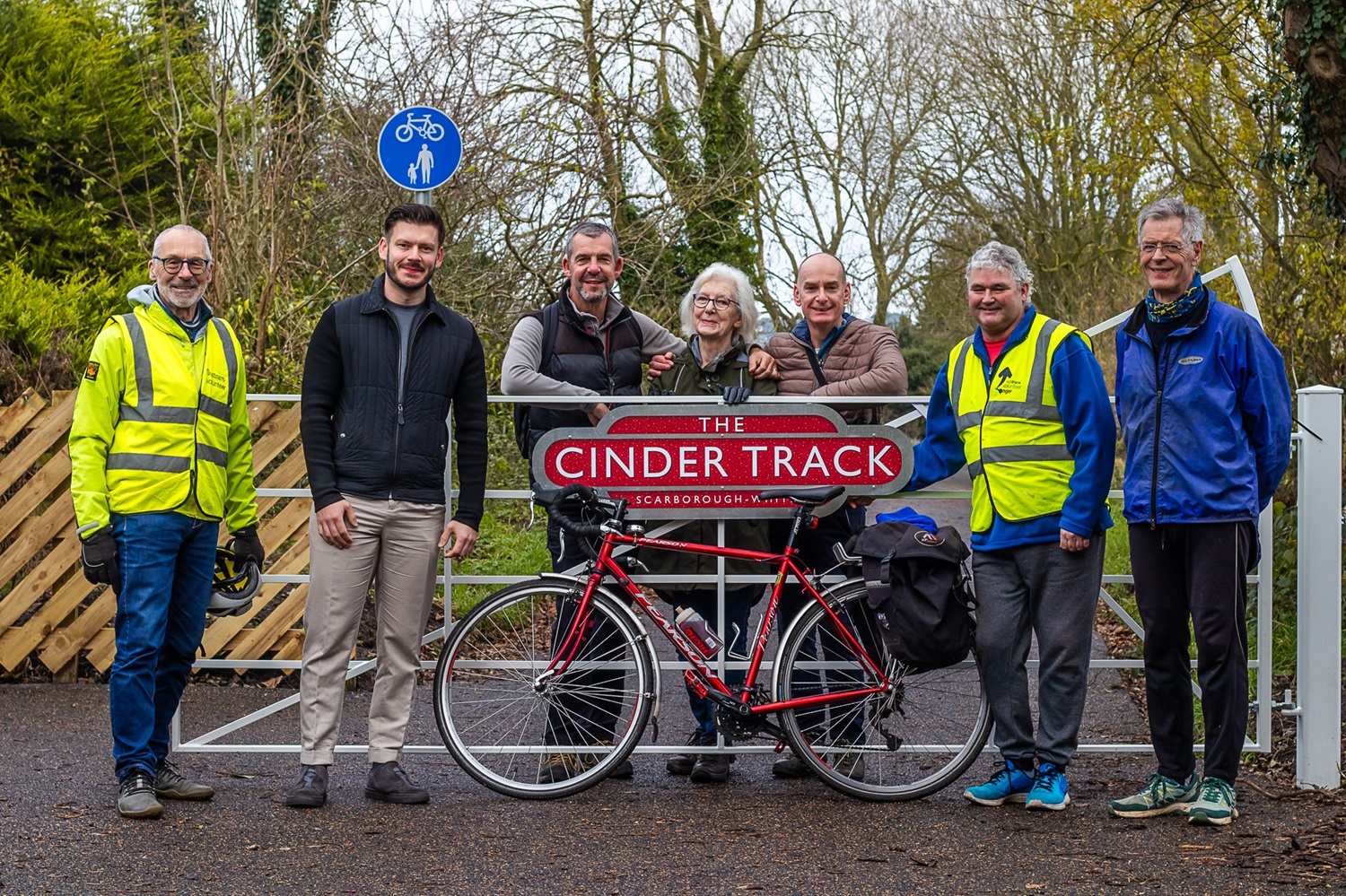 Cllr Keane Duncan (second left), with residents and volunteers from Sustrans on the upgraded Cinder Track. Credit: Phoebe Donbavand/Sustrans.