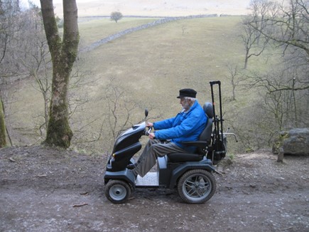 A man on a mobility scooter at Ingleborough Enterprises