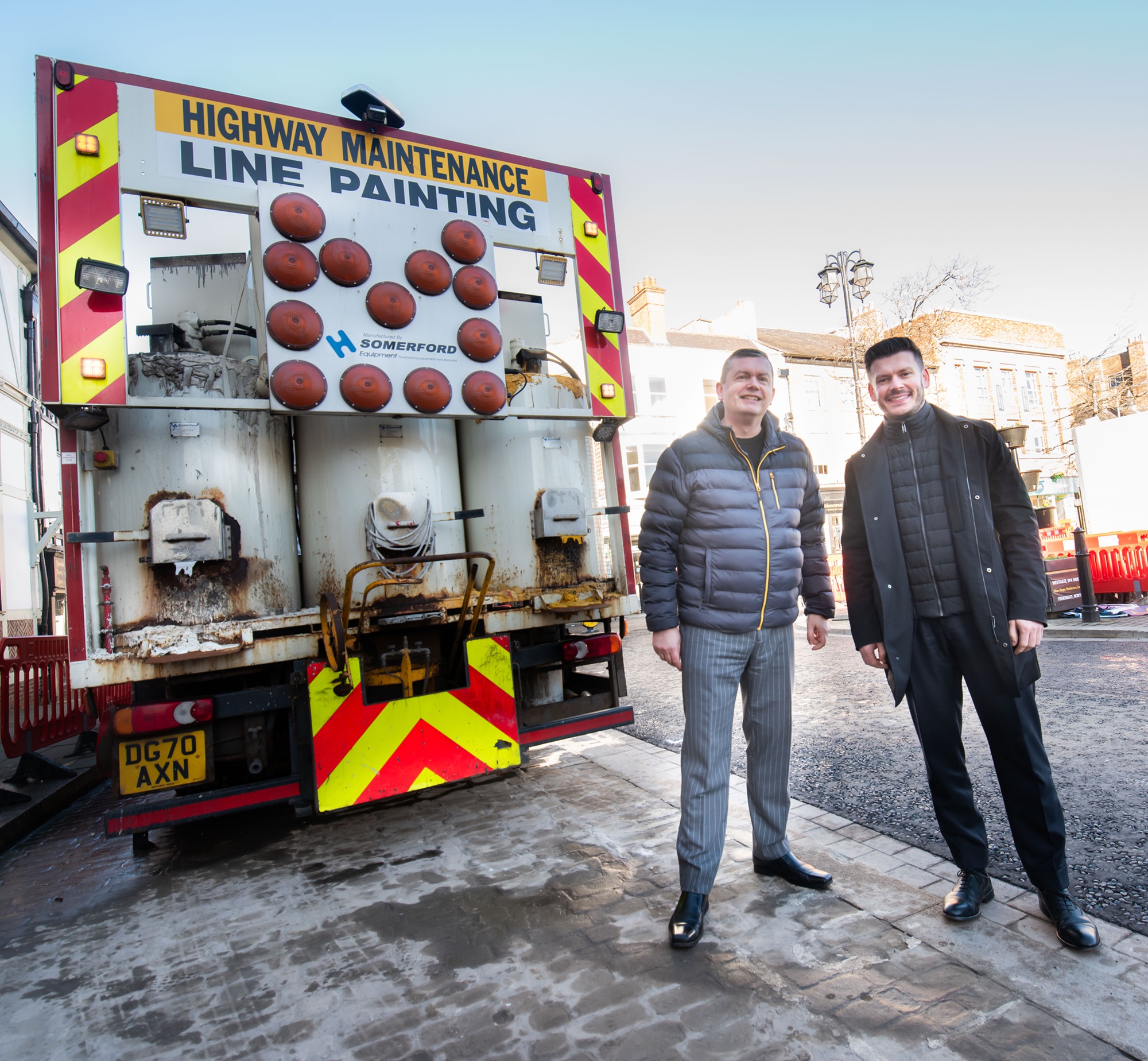 Cllr Andrew Williams (left) and Cllr Keane Duncan assessing the final stage of resurfacing and lining work. 