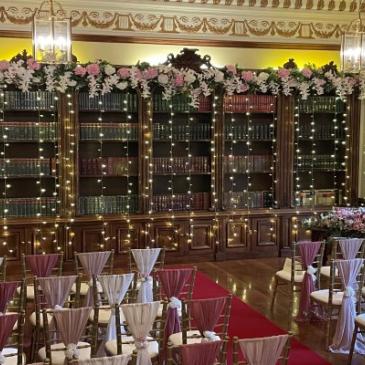 A room decorated for a wedding ceremony at Rudby Hall.