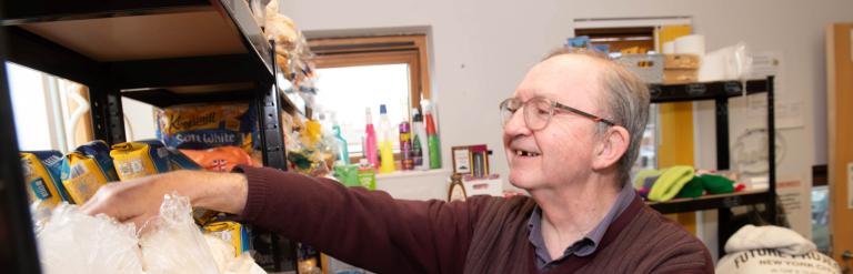 A person at a foodbank